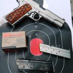 Ruger SR1911 10mm pistol with ammunition box and magazines