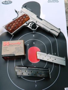 Ruger SR1911 10mm pistol with ammunition box and magazines