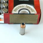 10mm Federal Hydra-shok bullet and ammunition box