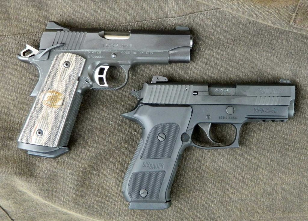 Kimber and Sig Sauer pistol right profile