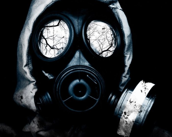 white gas mask with reflection in the eyes