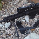 Ruger American rifle with Nikon scope, left profile