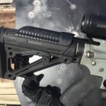 HABU charging handle over a hogue stock