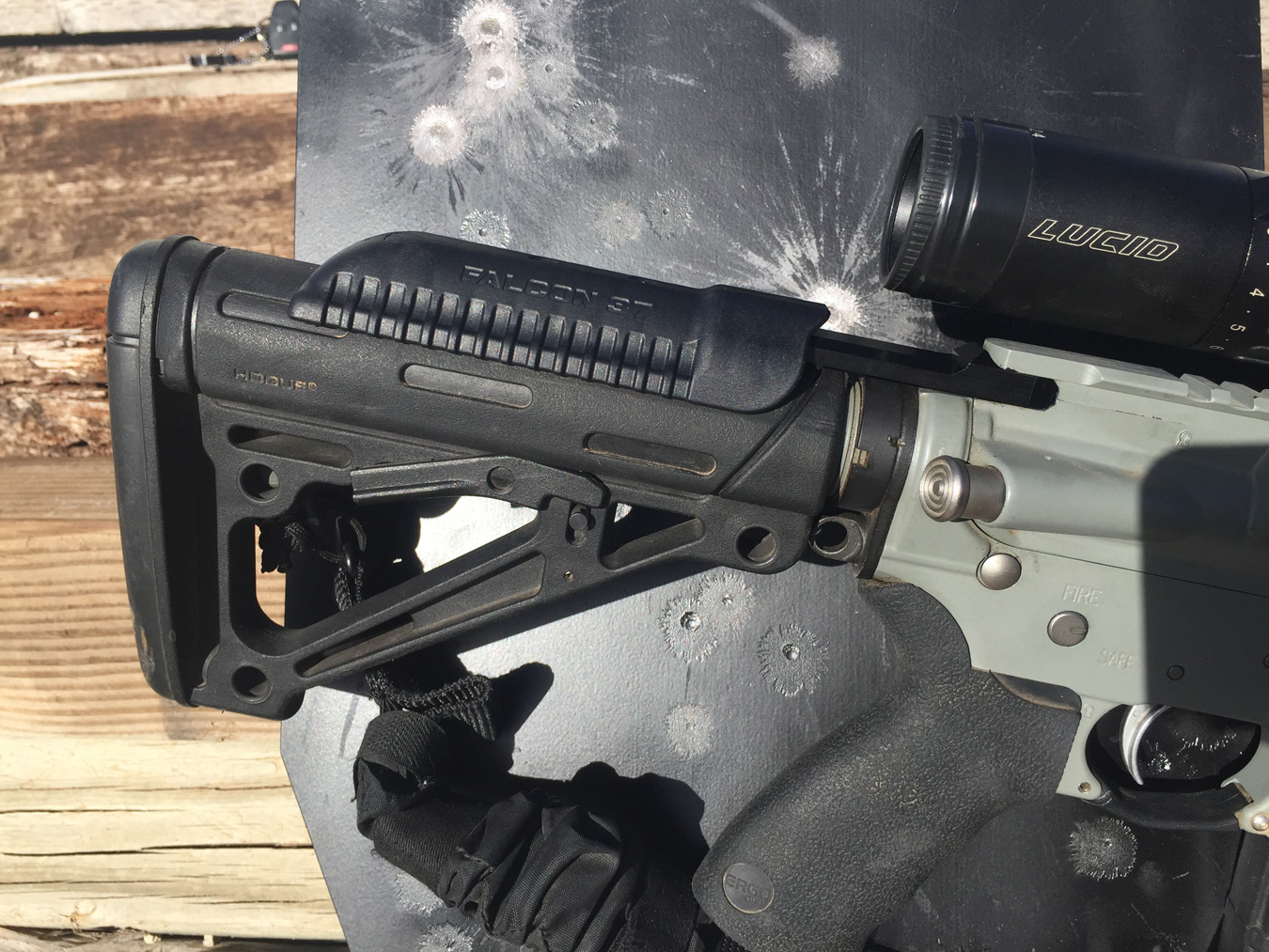 HABU charging handle over a hogue stock