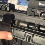closeup of the dust cover on an AR-15