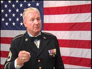 Sammy Lee Davis with congressional medal of honor