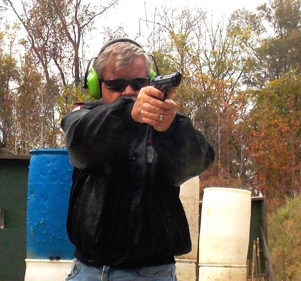Bob Campbell shooting the Beretta M9 pistol