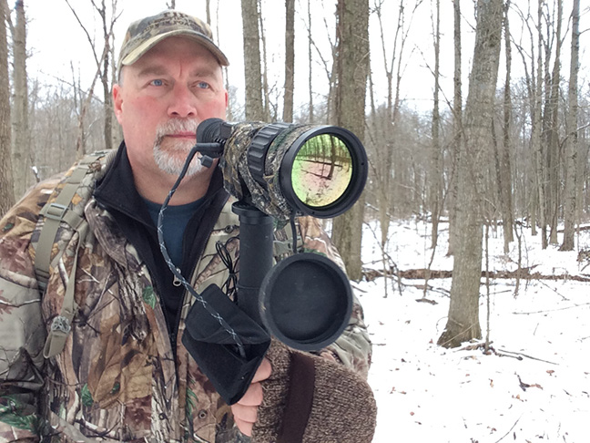 FLIR Zeus Pro 640 thermal riflescope mounted on a monopod using a tripod-to-Picatinny adapter