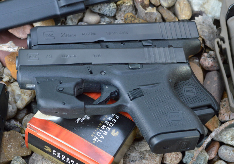 Glock G29 over a Glock 43 showing the length difference