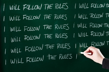 Writing follow the rules on the chalkboard