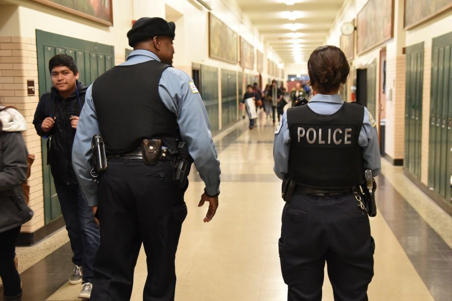 police officer in a school hallway