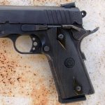 checkered plastic grips on the Taurus PT1911