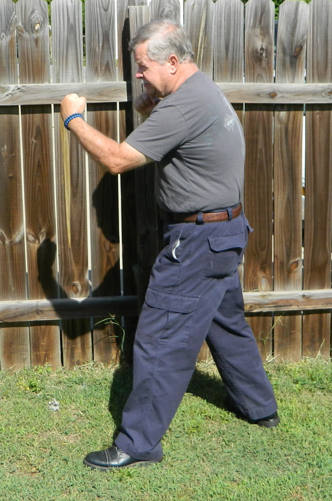 Man shadow boxing