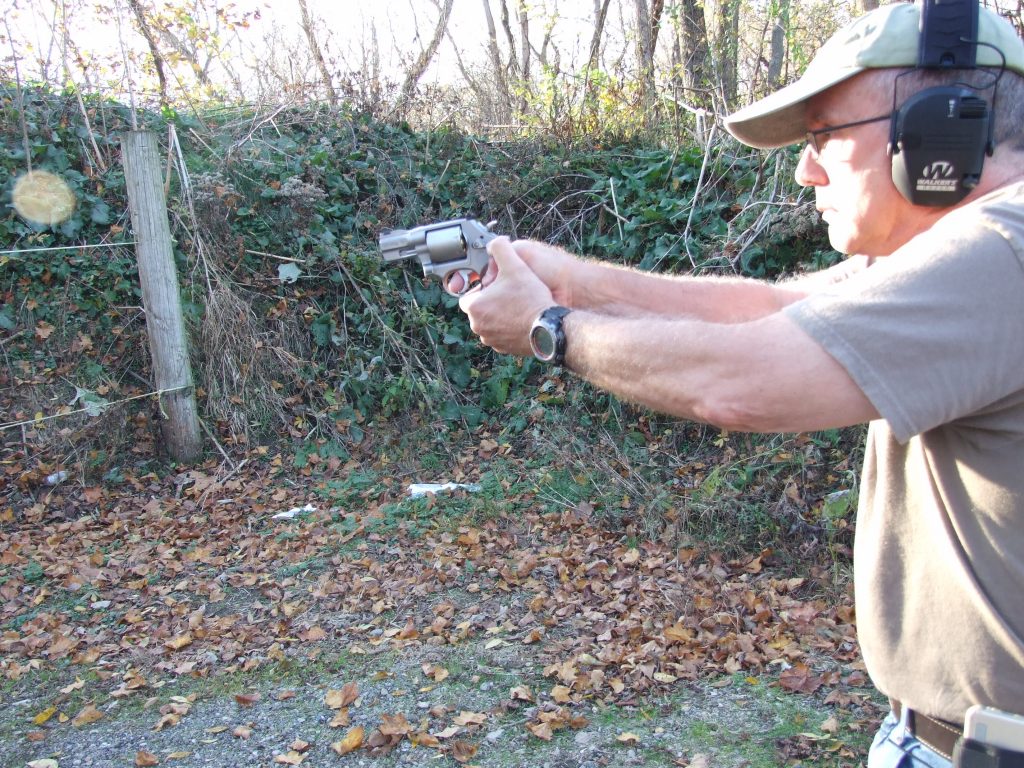 Scott Wagner shooting with a two-handed grip