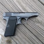 Browning FN1910 pistol right profile