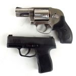 SIG P365 pistol (bottom) compared to a snub nose revolver.