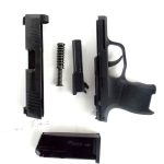 field stripped SIG P365 pistol