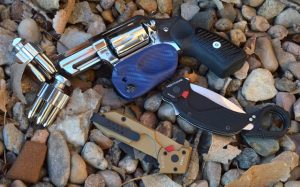 Extrema Ratio Nightmare Karambit with Glock and flashlight with revolver