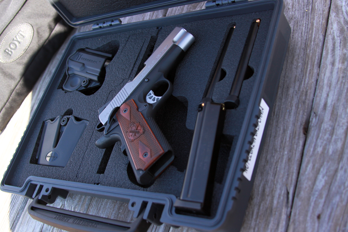 Springfield EMP 4 with spare magazines, holster and hard case