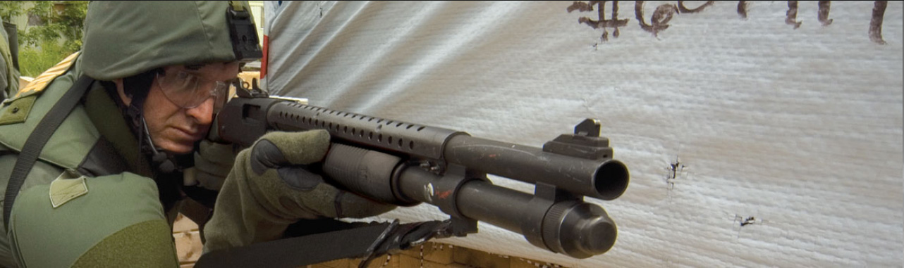 tactical operator with a shotgun Top 5 Ready for Action Shotguns of 2018