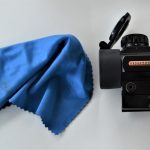 Rifle scope with lens cleaning cloth