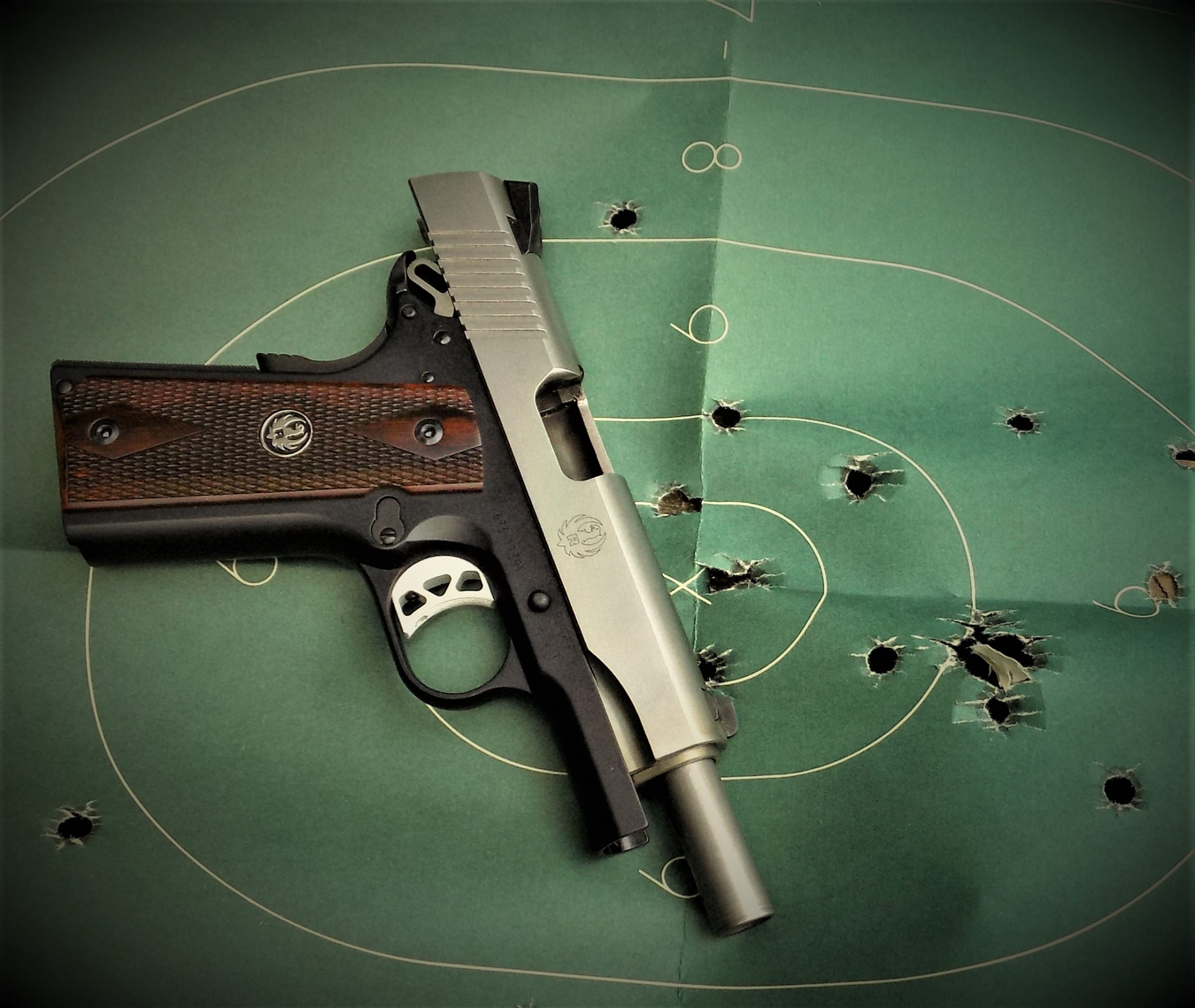 Ruger SR1911 Commander on a green silhouette target