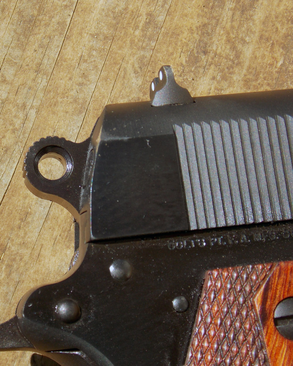 Rowel hammer on Colt Commander 1911 pistol