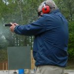 Bob Campbell shooting a 1911 Commander pistol off hand