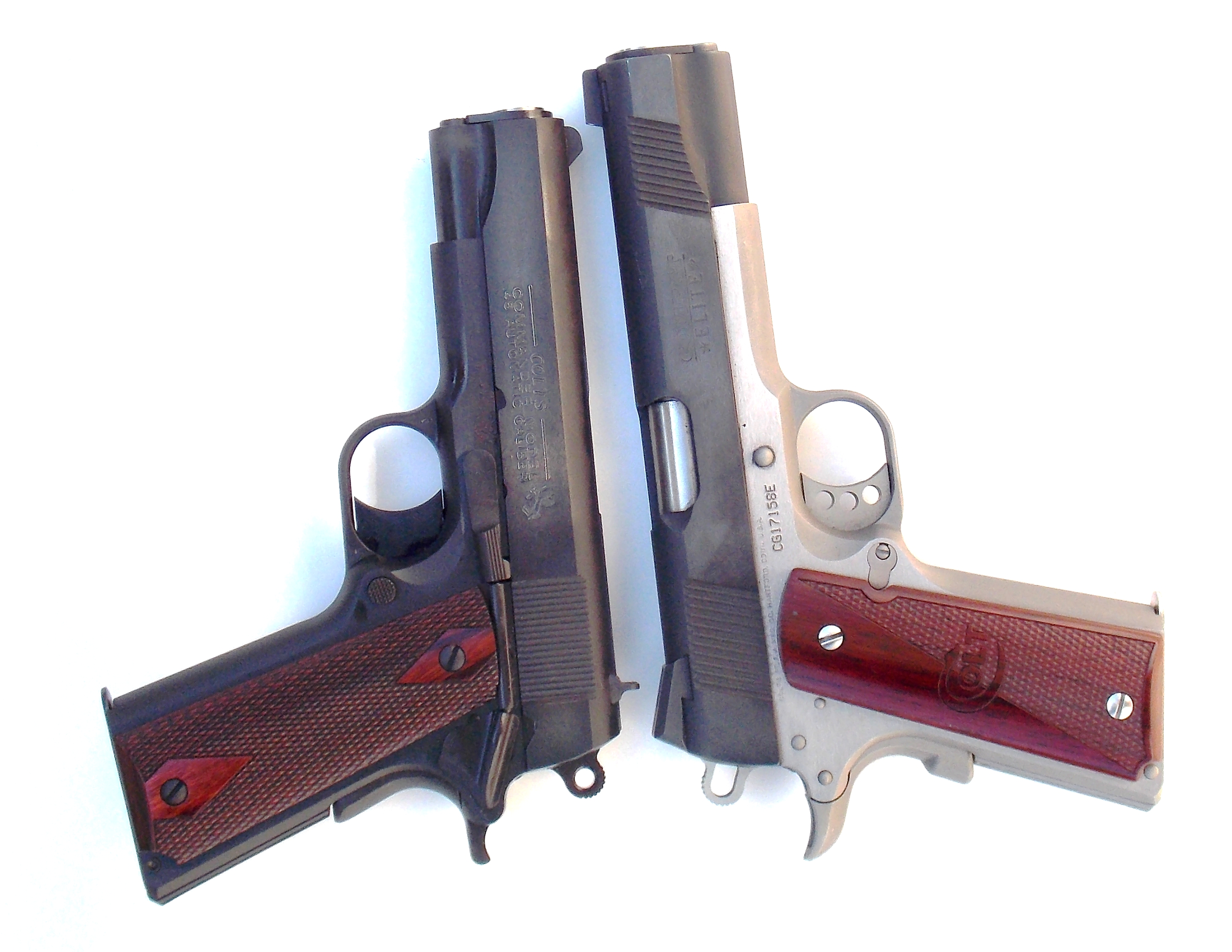 Commander left Government model 1911 pistol right