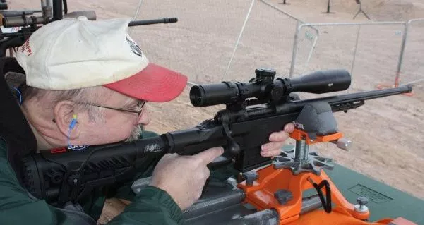 Dave Workman shooting the AR-15 from a shooting bench for FBI Uniform Crime Report