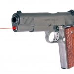 1911 handgun with LaserMax red laser
