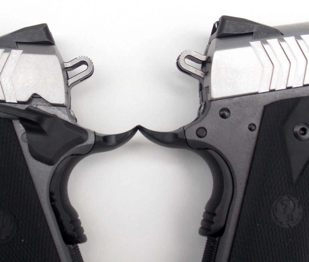 two custom grade beaver tail grip safeties on SR1911 pistols
