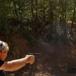 Glock 35 pistol with spent casing being ejected