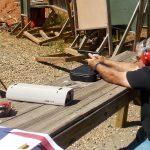 Bob Campbell shooting the Glock 35 from a shooting bench