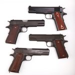 four 1911 .45 ACP handguns