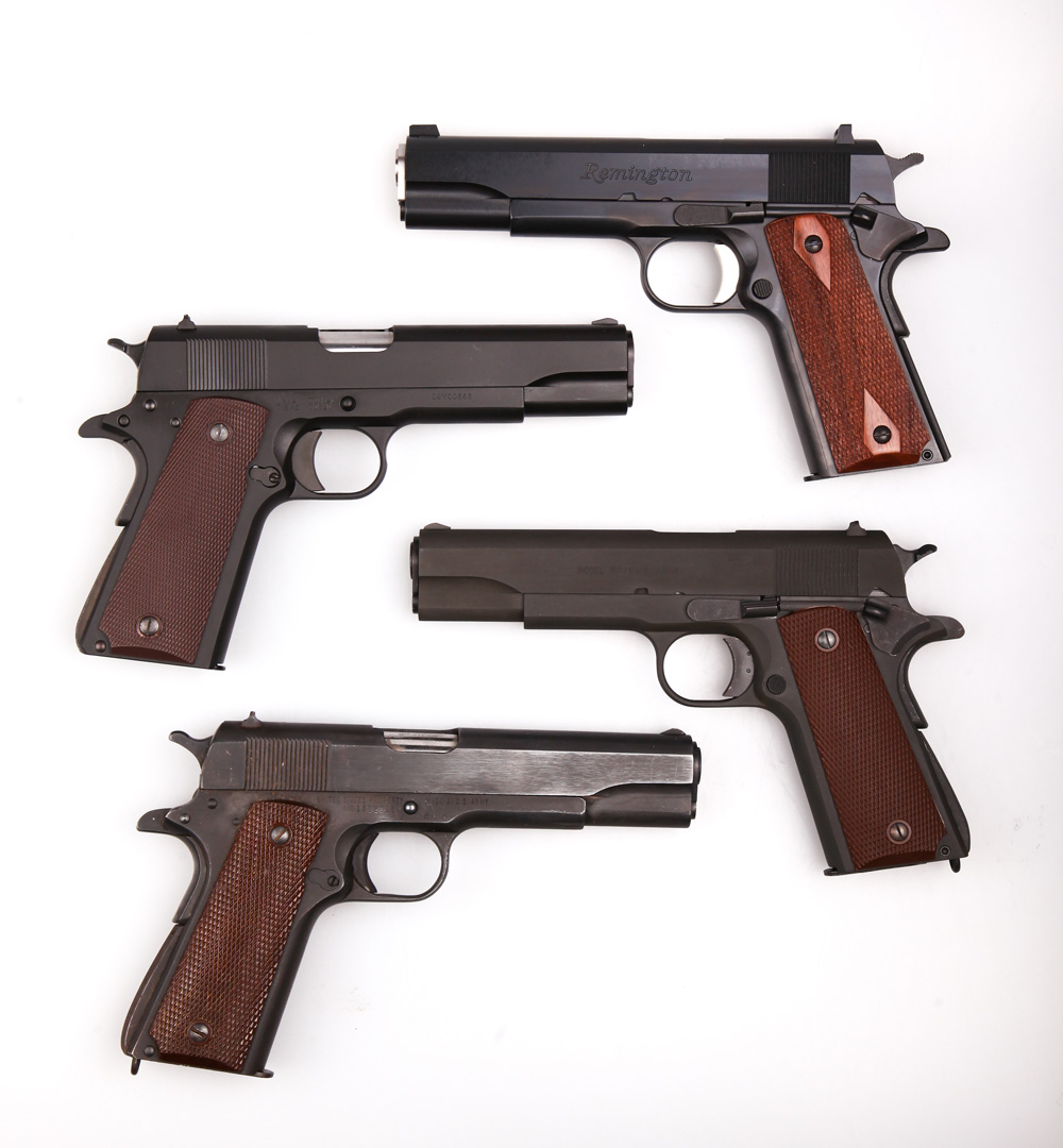 four 1911 .45 ACP handguns