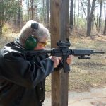 Bob Campbell shooting an AR-15 from a braced position