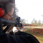 Man sighting through the SIG Sauer Romeo red Dot sight