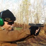 Bob Campbell shppting the Springfield XDE pistolwith slide locked back