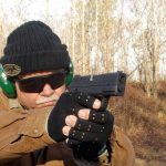 Bob Campbell aiming the Springfield XDE 9mm