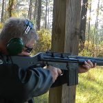 Firing a rifle from a braced position