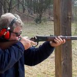 firing a lever-action rifle from a braced position