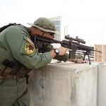LEO shooting an AR-15 rifle equipped with a bipod