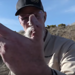 Patrick E. Kelley with a bloodied thumb from the Bersa BP9CC pistol