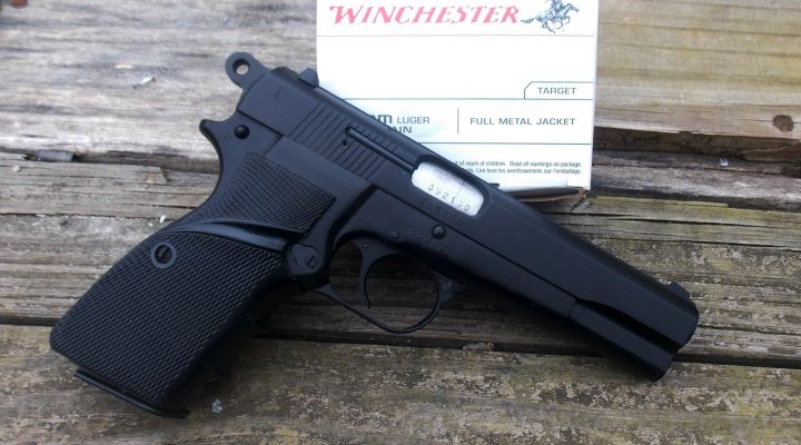 Browning Hi-Power clone right black with Winchester ammunition