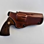 Colt Python revolver with Phoenix holster