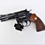 Colt Python revolver with speed loader