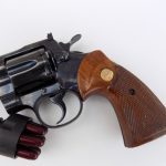 Colt Python revolver with speed loader