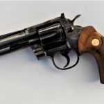 Colt Python revolver left profile wood grips