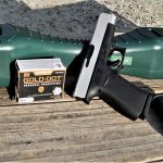 Glock 48 pistol with box of ammunition